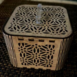 Wooden laser cut 3 1/2W“ x 3“H box with lid. Makes a cute children’s nightlight